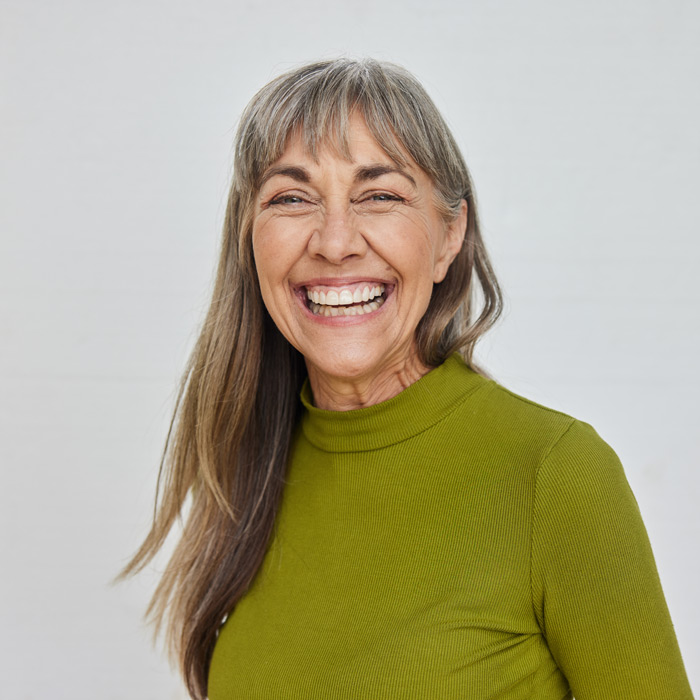 Carefree mature woman laughing
